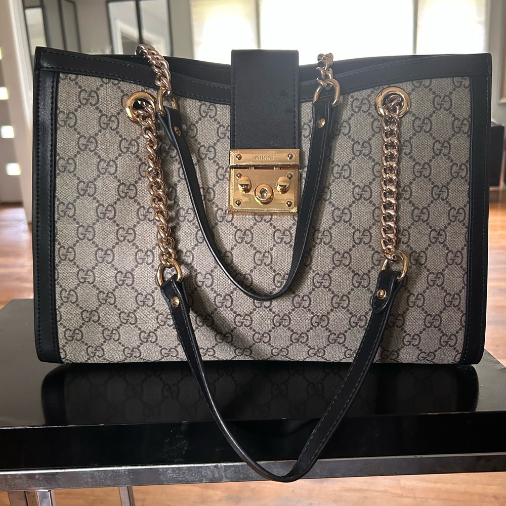 Gently Used Gucci Black and Gold Shoulder Bag with Padlock Closure